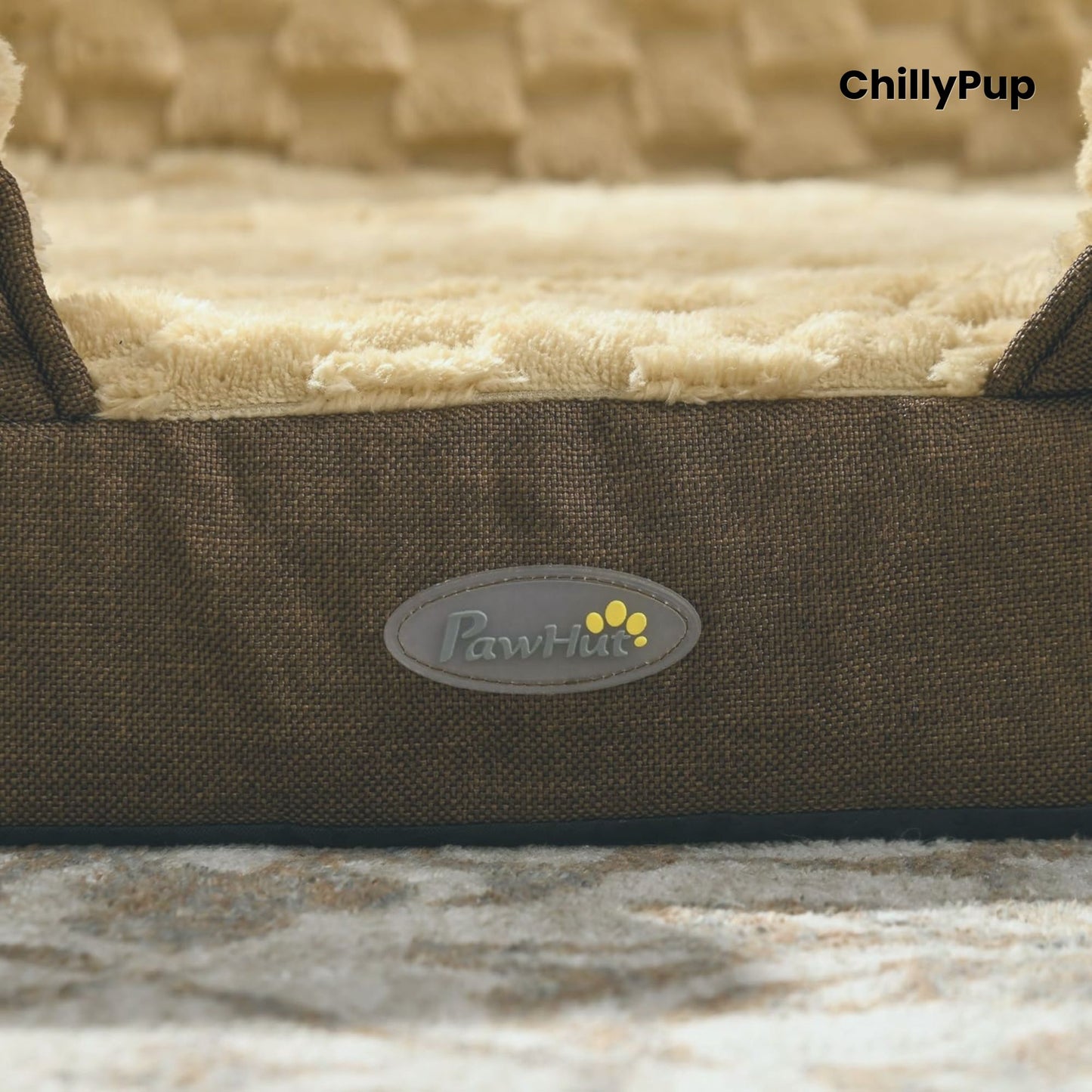 Brown pet bed with 'PawHut' logo and 'ChillyPup' branding on a textured surface.