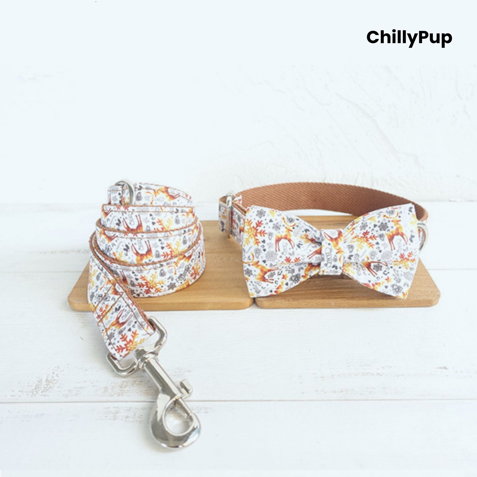 Dog collar set with Christmas pattern and silver hardware on a white background, branded 'ChillyPup'.