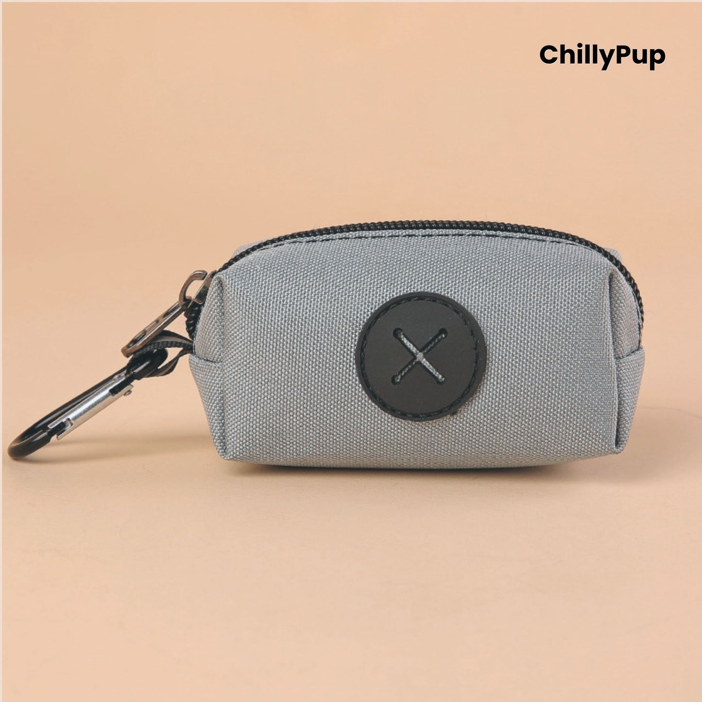 Grey Poo Bag Holder with black zipper and carabiner on a beige background, featuring the brand 'ChillyPup'.