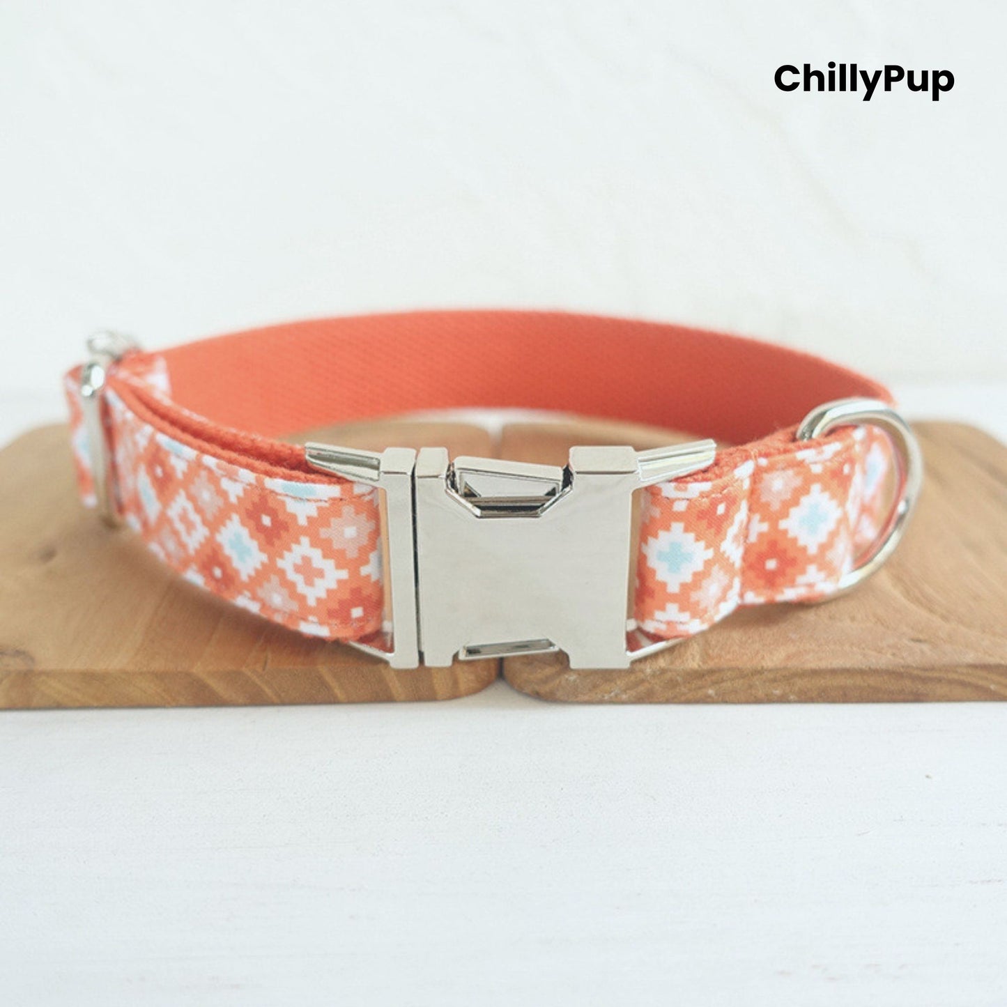 Dog collar with coral pattern on a wooden board, branded 'ChillyPup'.