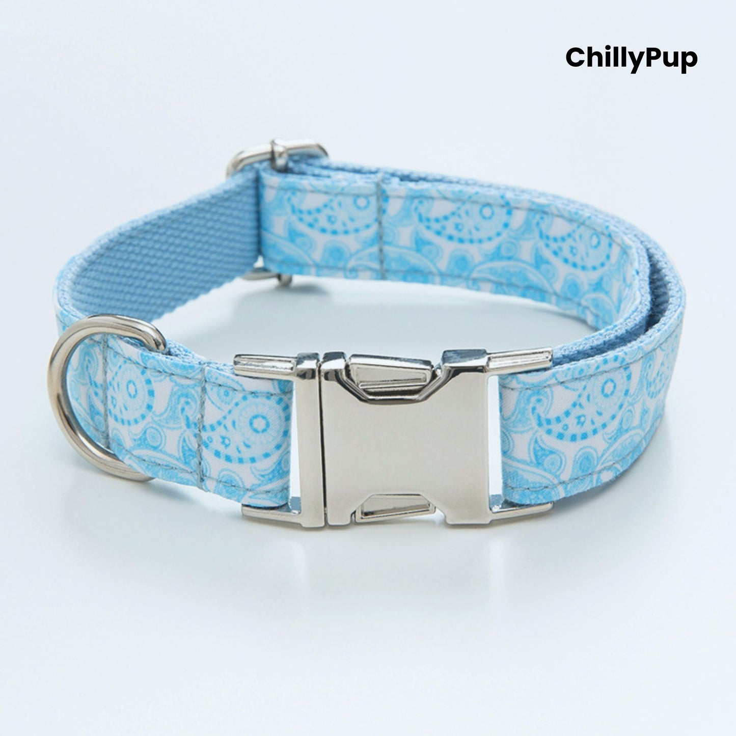 Blue patterned dog collar with silver buckle on a white background, branded 'ChillyPup'.