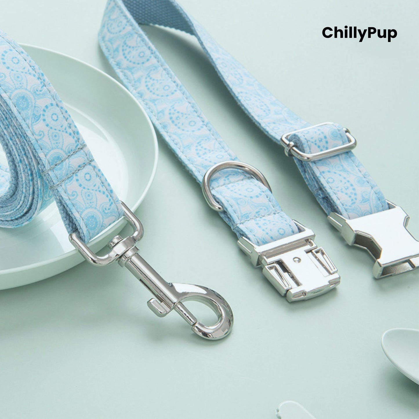 Dog collar and lead set with blue pattern on a light green background, branded 'ChillyPup'