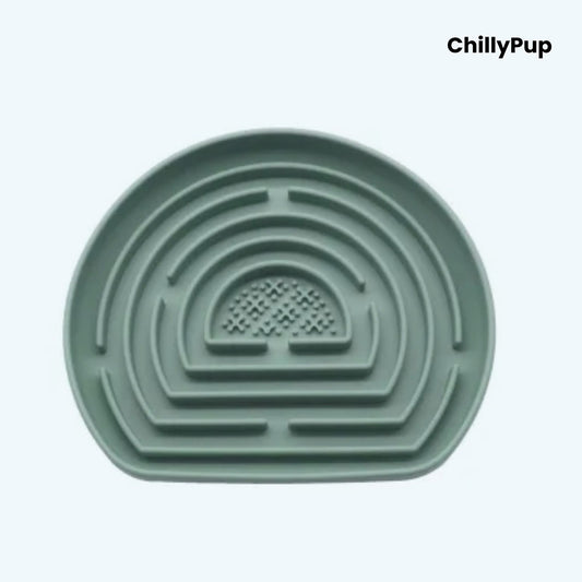 Green pet bowl with maze design on a light purple background, branded 'ChillyPup'.