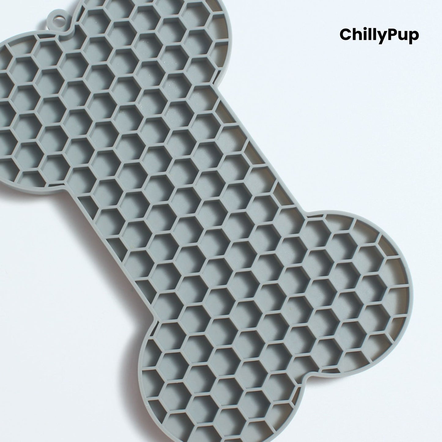 Bone shaped lick mat with ChillyPup branding.