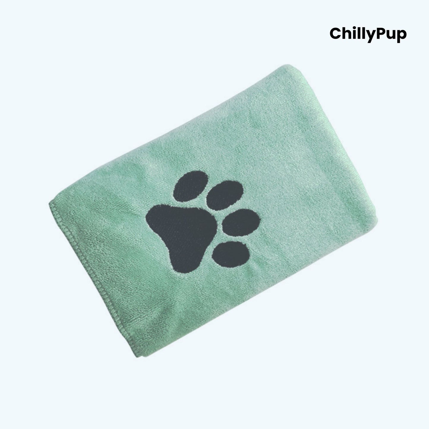 Green towel with black paw print logo on a white background, branded 'ChillyPup'.