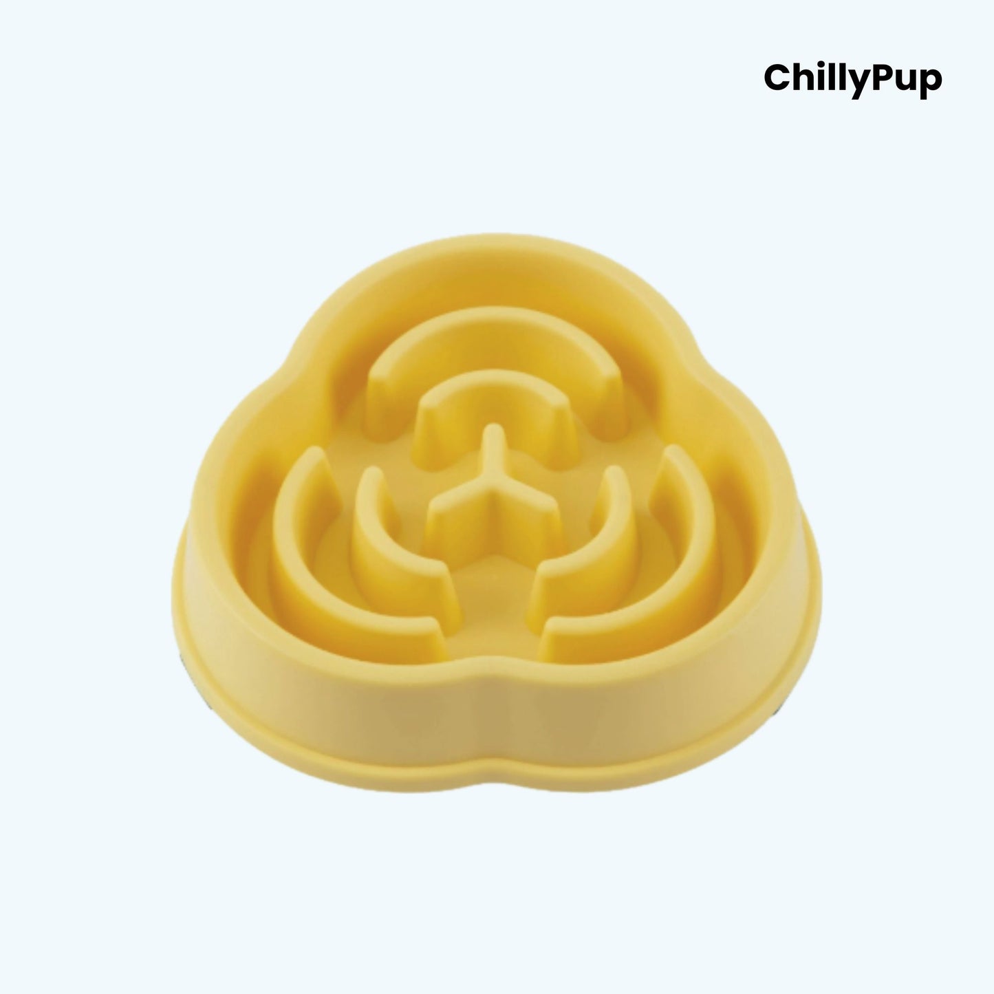Yellow silicone pet bowl with maze design on a light blue background, branded 'ChillyPup'.