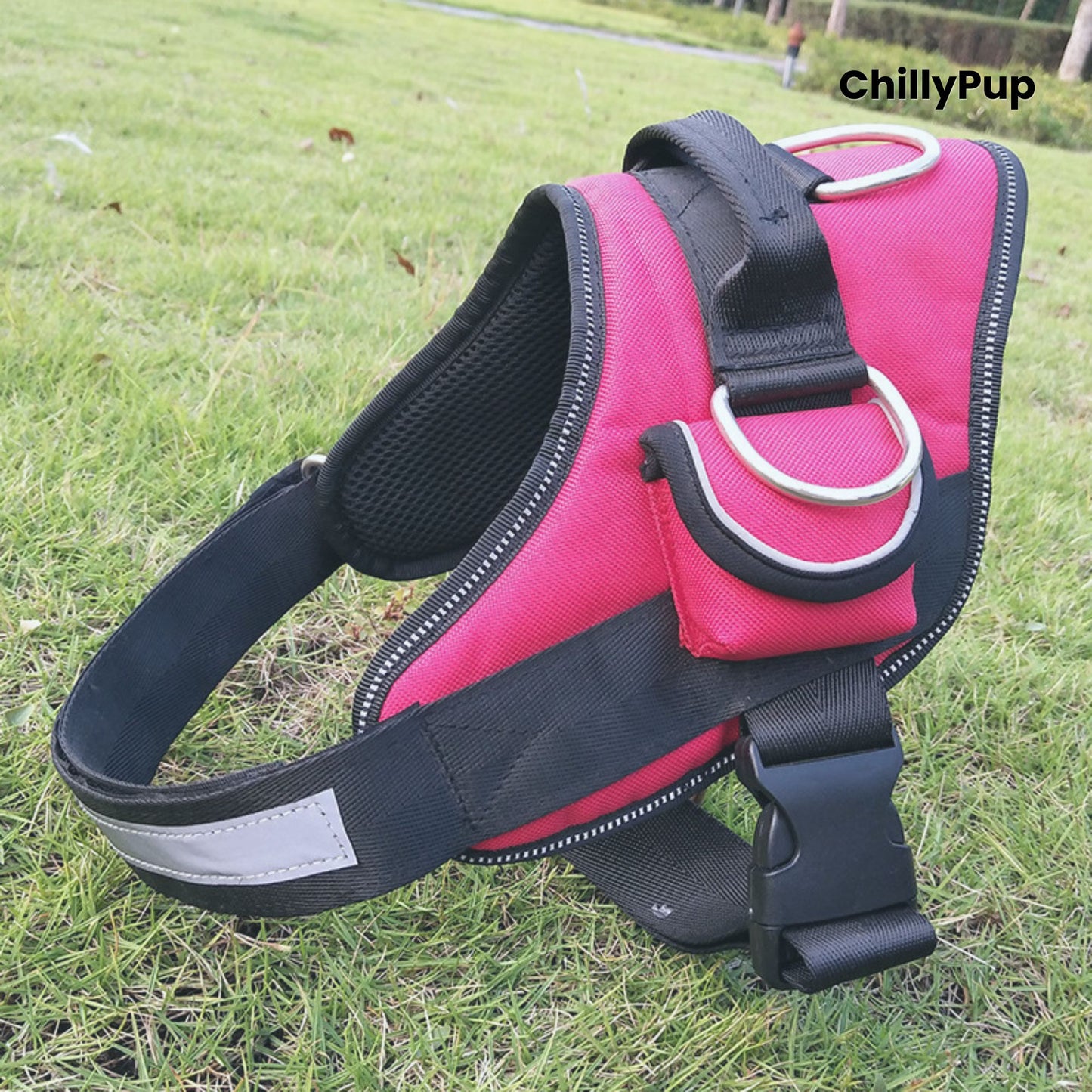 Pink and black dog harness on grass with 'ChillyPup' branding