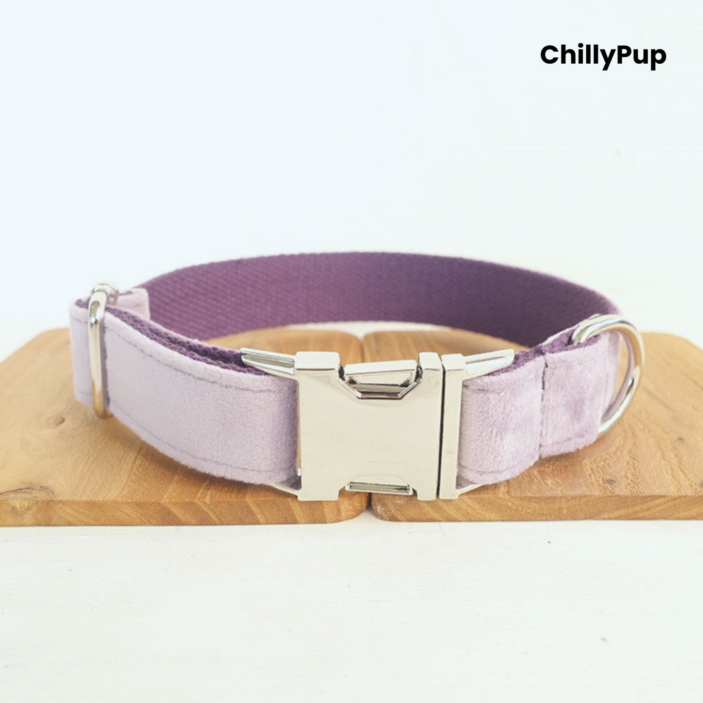 Lavender dog collar on a wooden board with 'ChillyPup' branding.