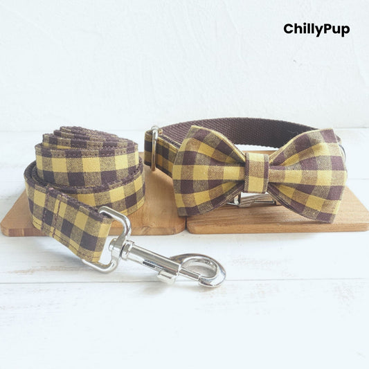 Yellow Check Collar, Lead & Bow Set with metal clip on a textured white background, branded 'ChillyPup'.