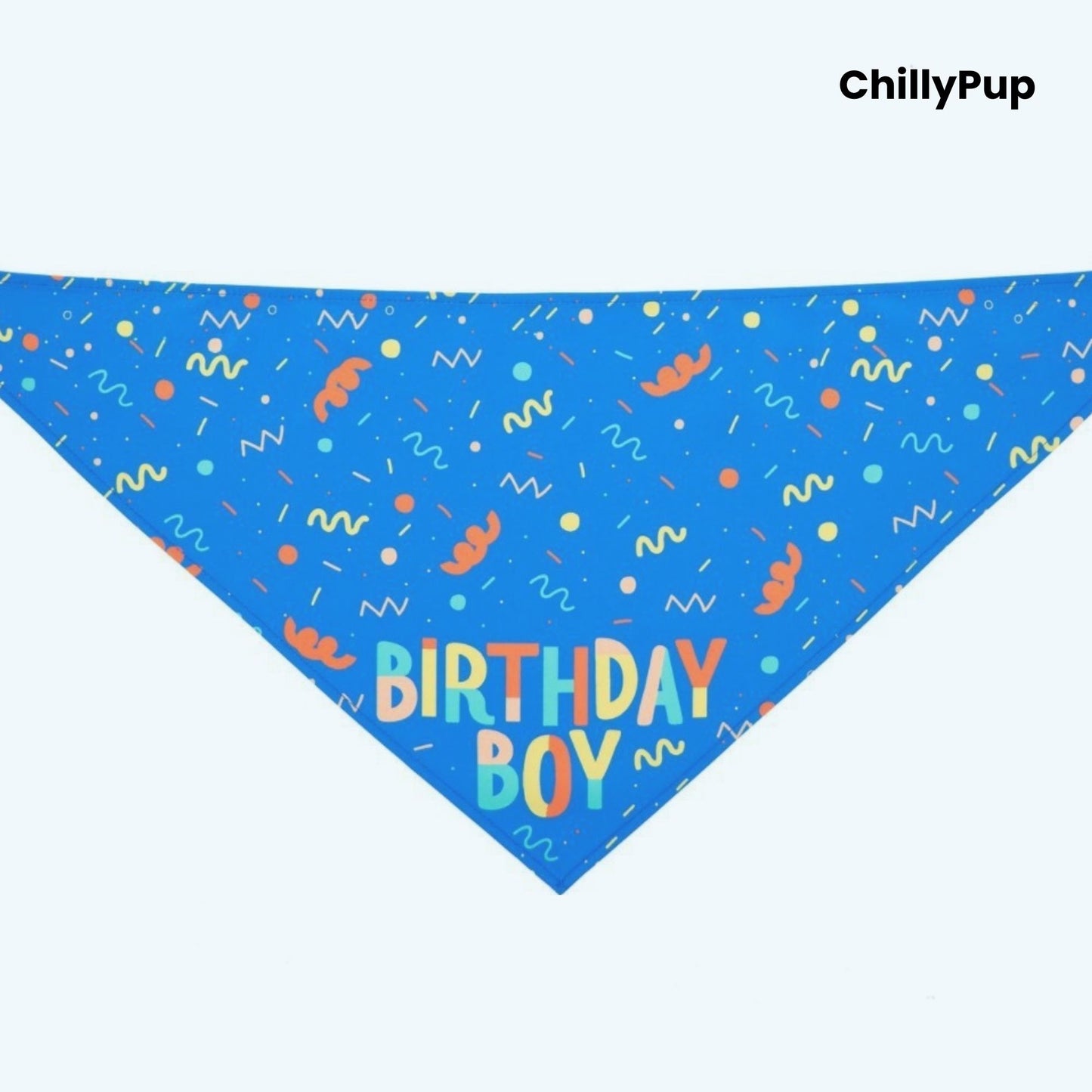 Blue dog bandana with 'Birthday Boy' text and colorful confetti pattern on a white background, branded 'ChillyPup'.