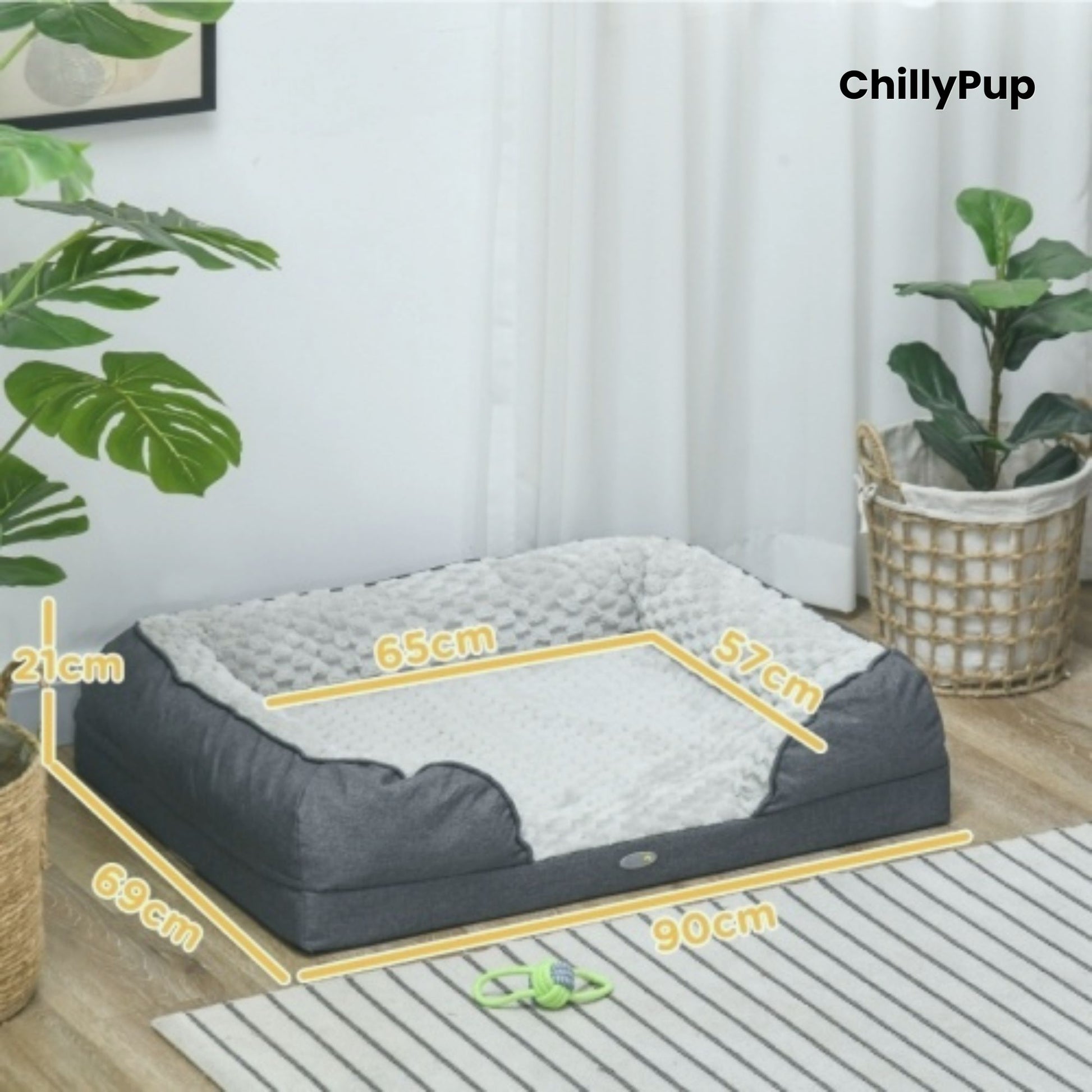 Dog lying on a grey pet bed with 'PawHut' branding, featuring the brand name 'ChillyPup'.