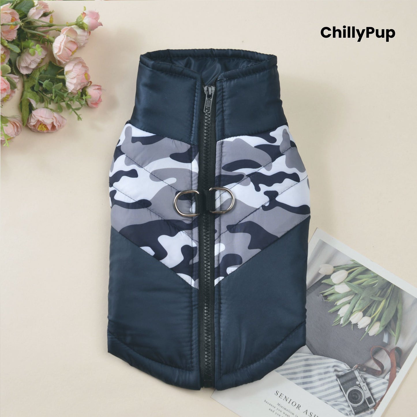 Dog coat with camouflage pattern and navy blue sections on a light background, branded 'ChillyPup'.