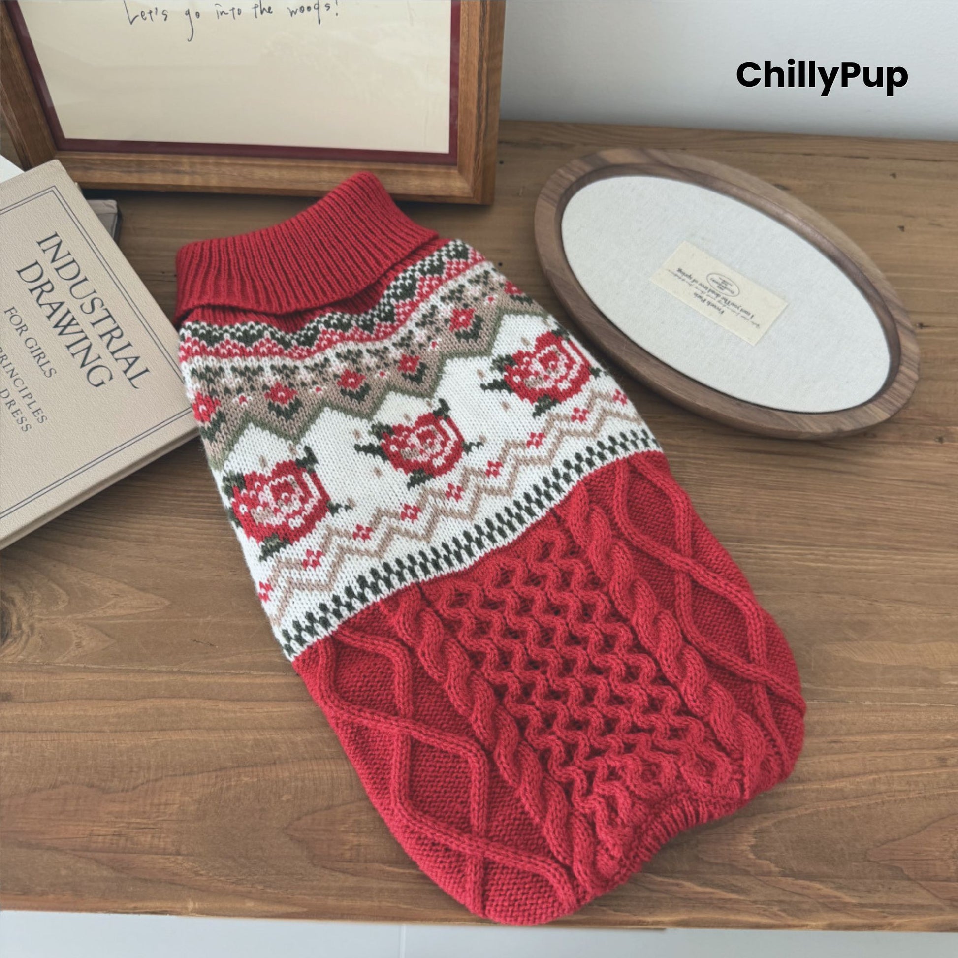 Red patterned dog jumper on a wooden surface with 'ChillyPup' branding