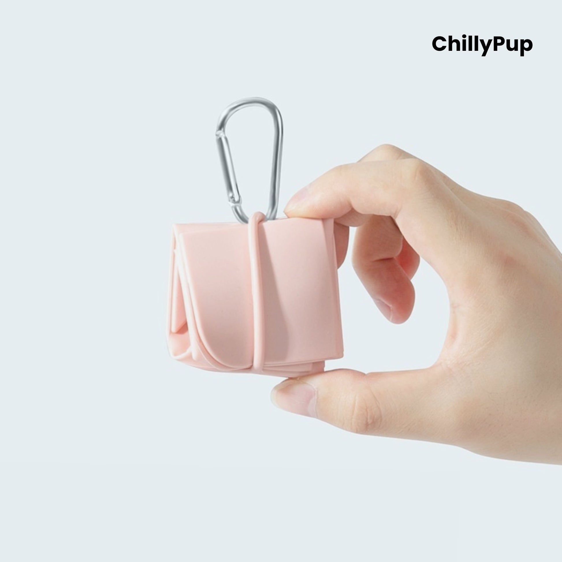 Pink foldable travel dog bowl with ChillyPup branding.