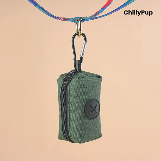 Green Poo Bag Holder with black zipper and carabiner on a beige background, featuring the brand 'ChillyPup'.