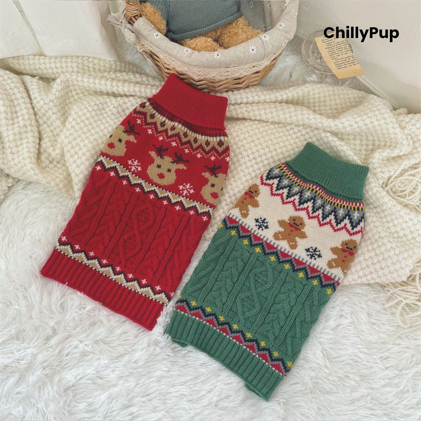 Two dog sweaters, one red and one green, with gingerbread men pattern on a textured surface.