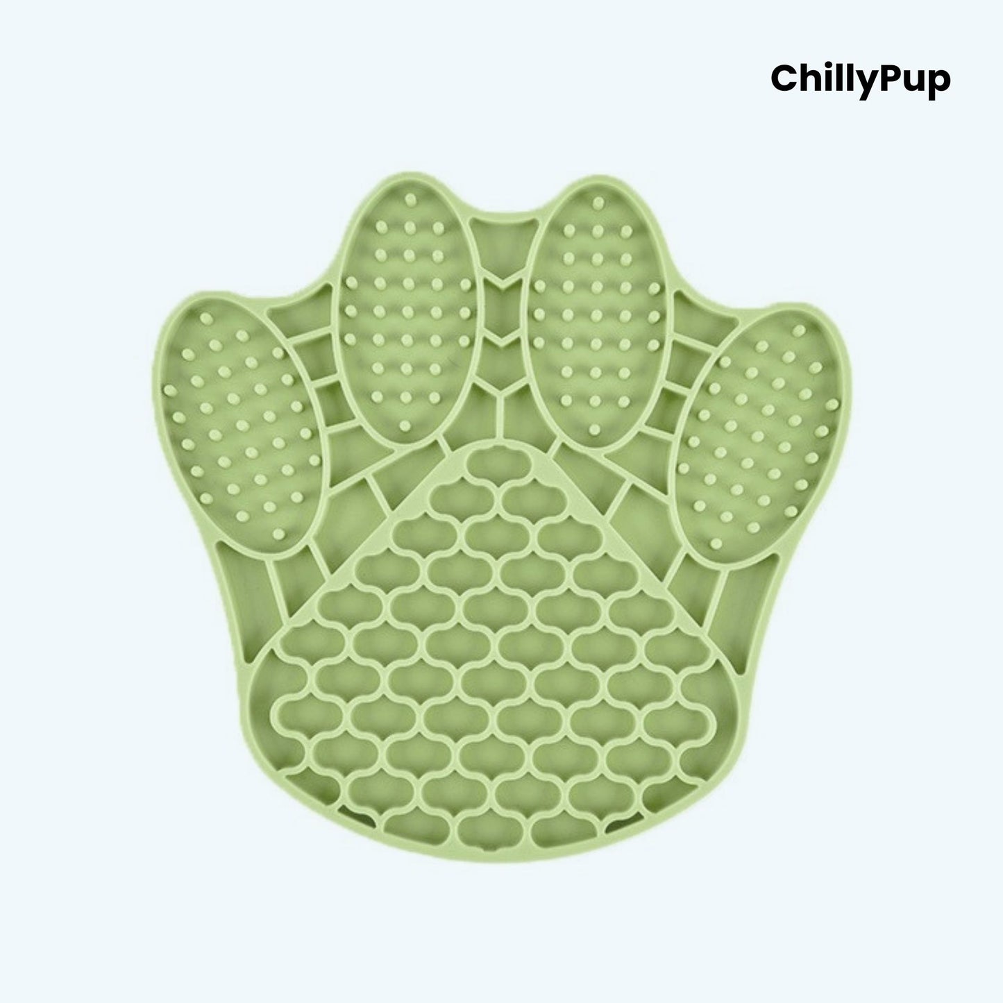 Green paw-shaped silicone mat with textured surface on a light blue background, branded 'ChillyPup'.
