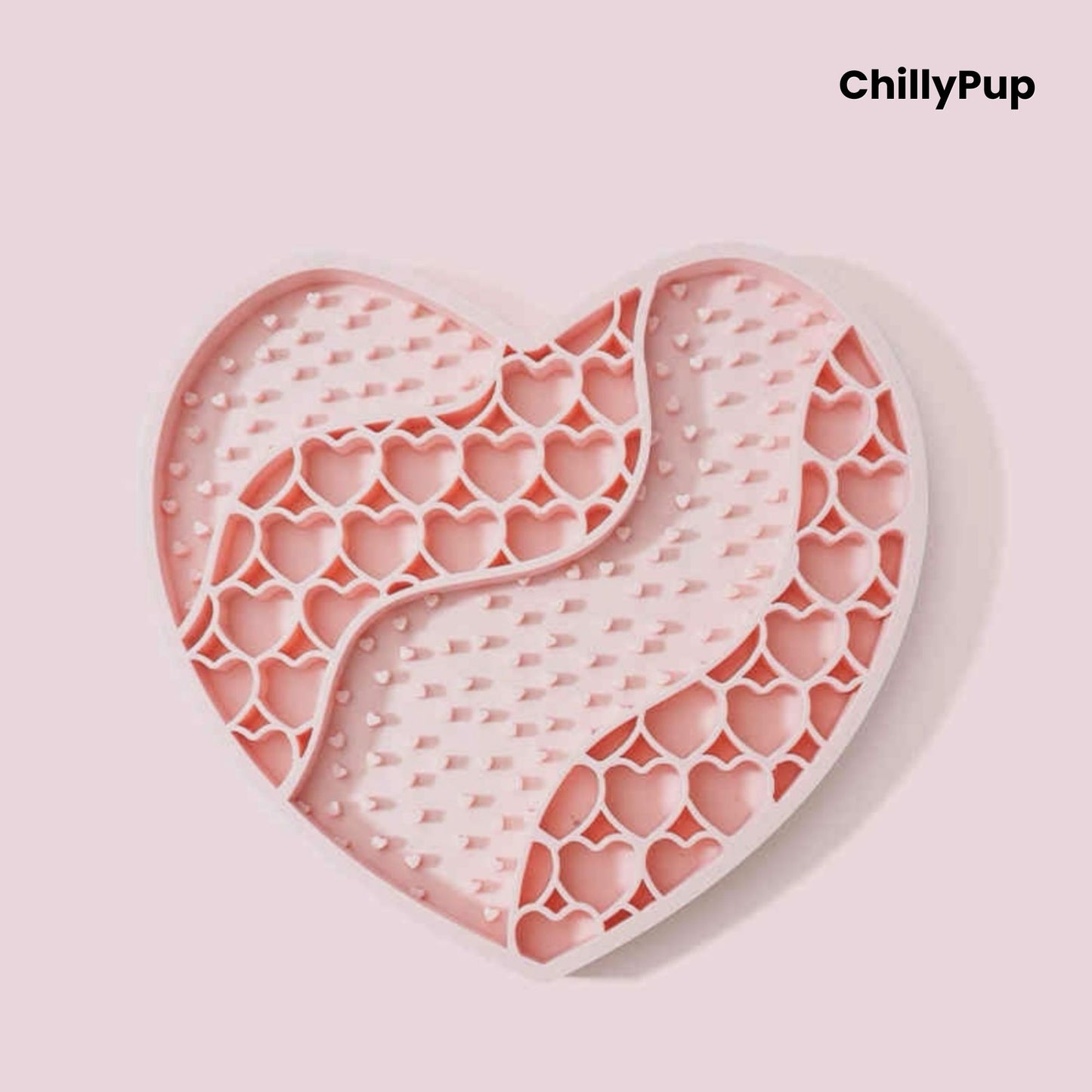 Heart-shaped purple dog lick mat with textured surface on a light gray background, branded 'ChillyPup'.