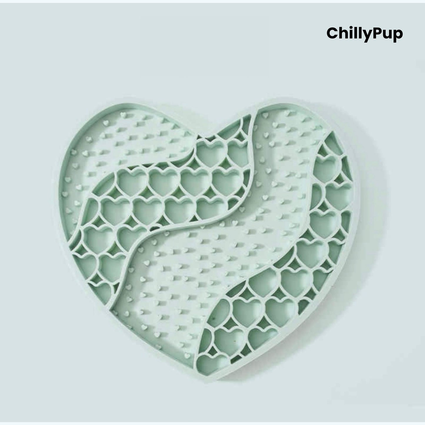 Heart-shaped purple dog lick mat with textured surface on a light gray background, branded 'ChillyPup'.