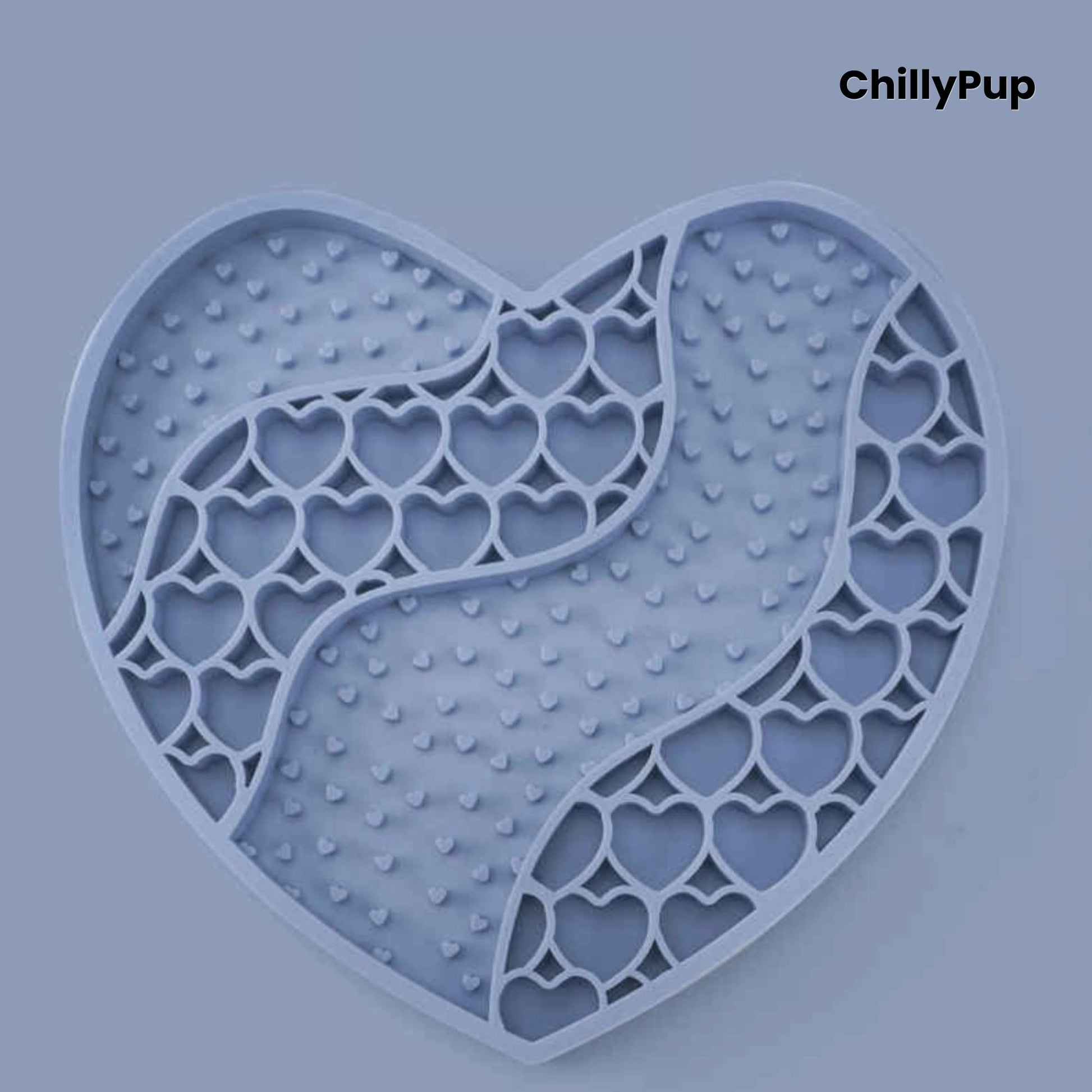 Heart-shaped purple dog lick mat with textured surface on a light gray background, branded 'ChillyPup'.