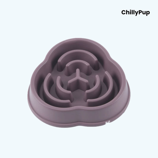 Purple silicone pet bowl with maze design on a light blue background, branded 'ChillyPup'.