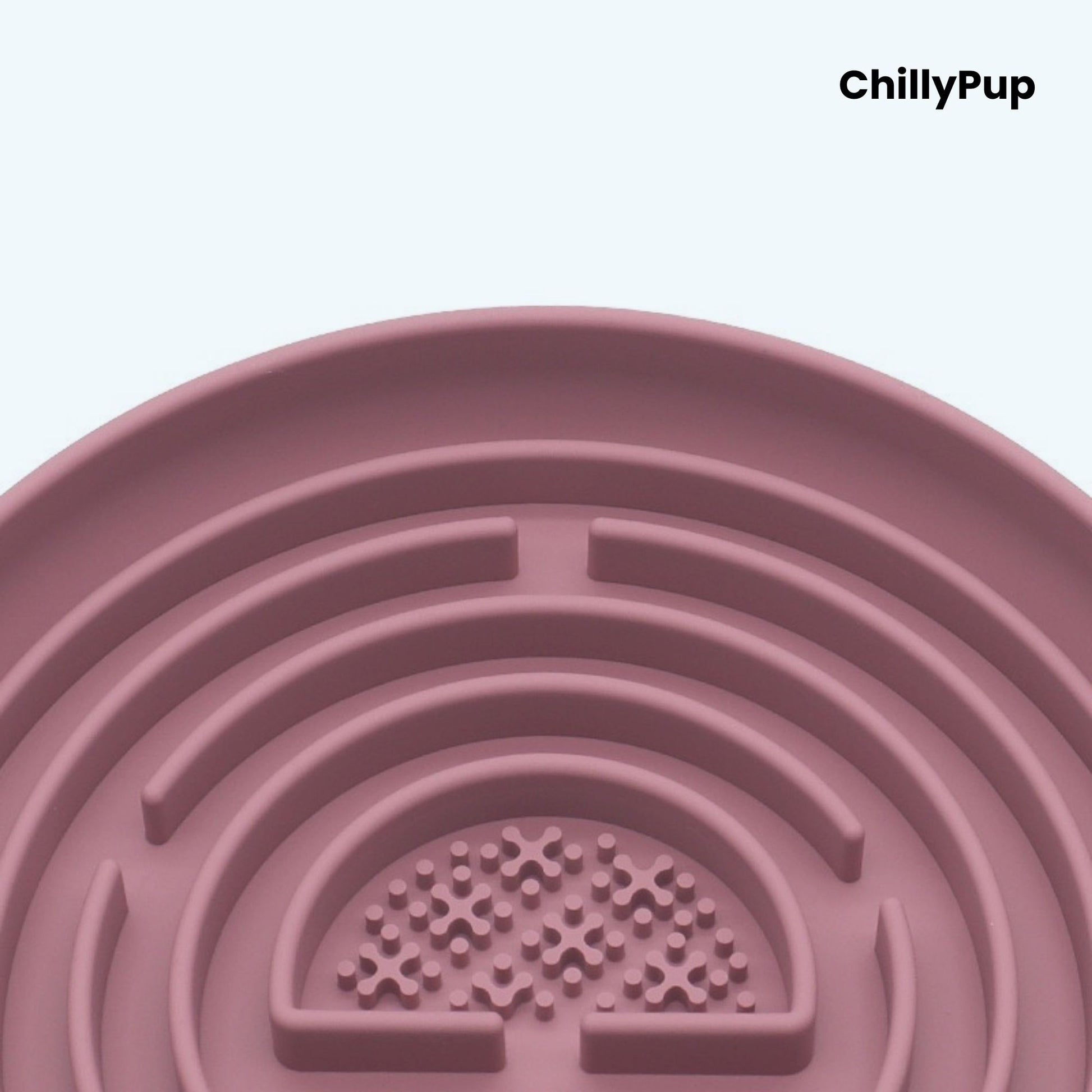 Pink pet bowl with maze design on a light purple background, branded 'ChillyPup'.