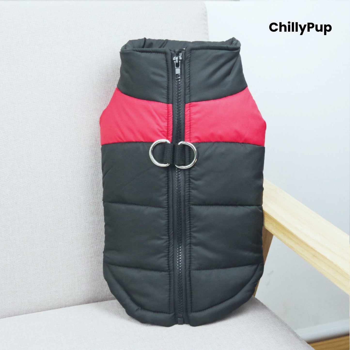 Black and Red dog coat with a visible Chillypup name on a light grey surface.
