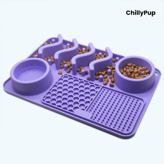 Purple pet feeding mat with two bowls  on a light grey background, branded 'ChillyPup'.