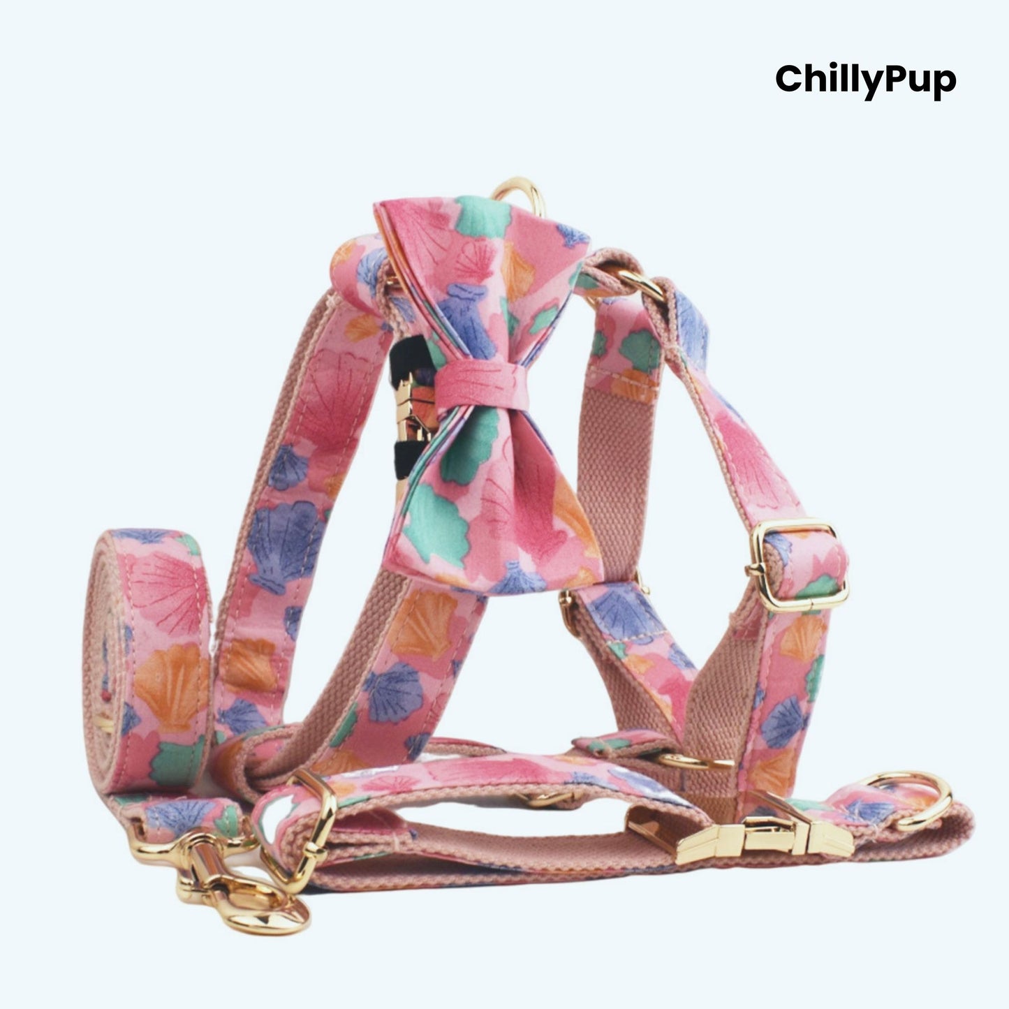 Seashell dog collar and lead set with gold hardware on a white background, branded 'ChillyPup'.