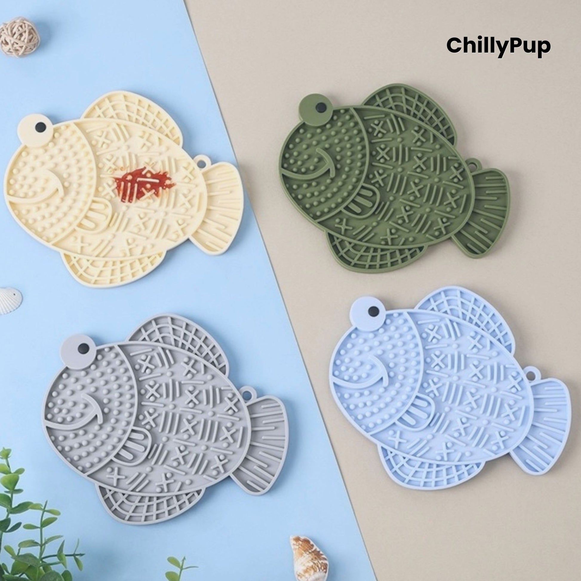 Four fish-shaped silicone mats in Apricot, green, grey, and blue on a light blue and beige background with 'ChillyPup' branding.