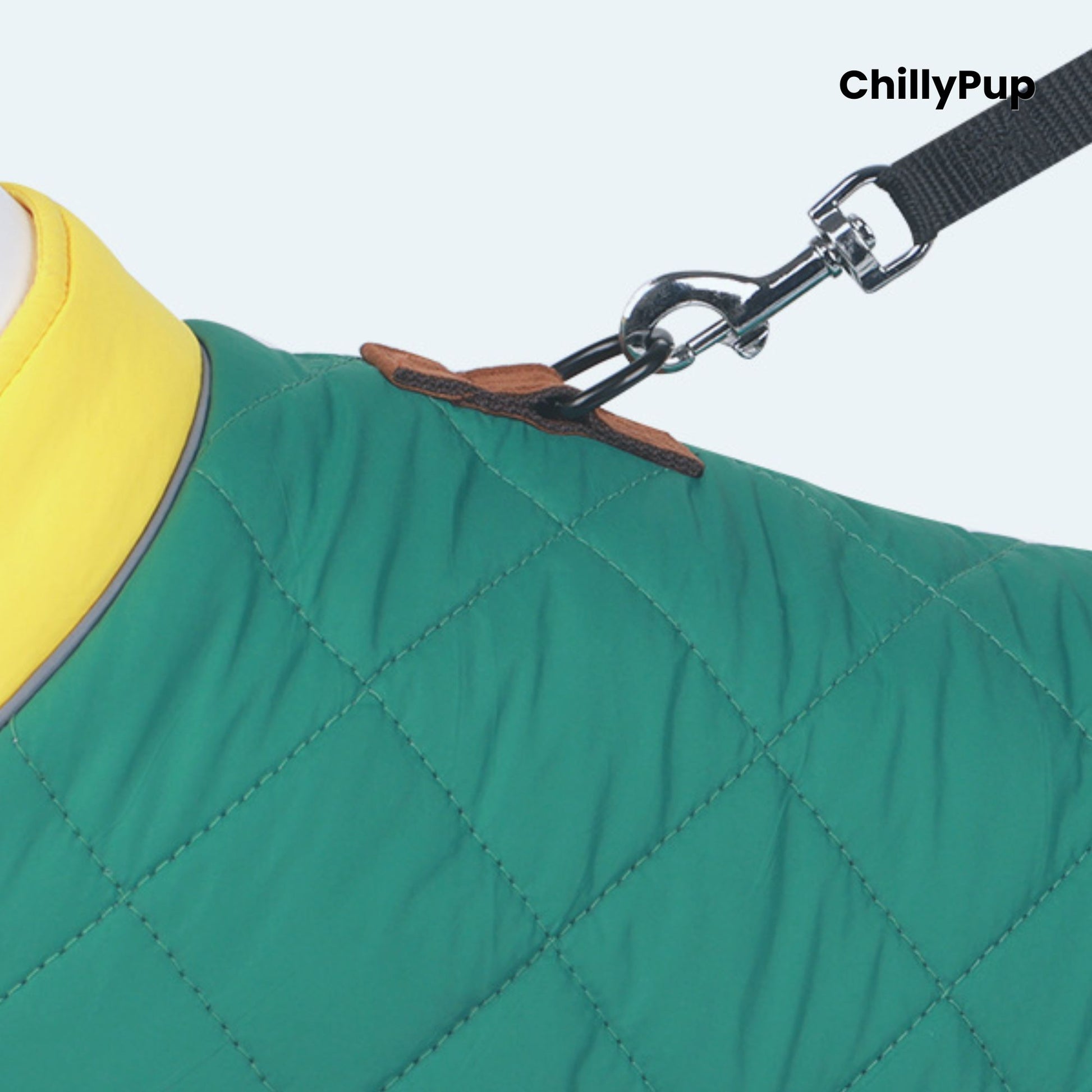 Green quilted dog vest with a yellow inner lining and black leash attachment on a light blue background, branded 'ChillyPup'